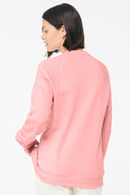 Pink BELLA+CANVAS Unisex Sponge Fleece Raglan Sweatshirt. BC3901